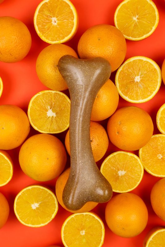 Παιχνίδι σκύλου μεγάλο Taste & fun Orange fruity bone 0.3 κιλά